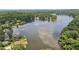 Expansive lake view showcasing the serene waterfront homes and lush, green surroundings at 890 Lake Dr, Snellville, GA 30039