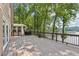Spacious back deck boasts lake views, ideal for entertaining or relaxation at 890 Lake Dr, Snellville, GA 30039