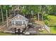 Charming boathouse with a covered boat slip and sun deck at 890 Lake Dr, Snellville, GA 30039