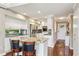 Modern kitchen with an island, stainless steel appliances, and bright white cabinets, offering a sleek design at 890 Lake Dr, Snellville, GA 30039