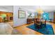 Formal dining room featuring hardwood floors, elegant lighting, and stylish decor at 1138 Berkeley Rd, Avondale Estates, GA 30002