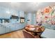 Open kitchen with light blue cabinets, an eat-in kitchen, and stainless steel appliances at 1138 Berkeley Rd, Avondale Estates, GA 30002