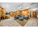 Open-concept living room and kitchen space, with hardwood floors and comfortable furnishings at 1138 Berkeley Rd, Avondale Estates, GA 30002