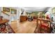 Spacious living room with hardwood floors, oriental rugs and stylish decor at 1138 Berkeley Rd, Avondale Estates, GA 30002