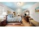 Bright main bedroom with hardwood floors, and warm decor at 1138 Berkeley Rd, Avondale Estates, GA 30002