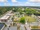 Aerial of town green, featuring a landscaped park with a circular lawn and surrounding buildings at 1138 Berkeley Rd, Avondale Estates, GA 30002
