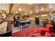 Basement with a variety of games and entertainment options with wood paneling at 1371 N Highland Ne Ave, Atlanta, GA 30306