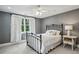 Bedroom features a queen sized bed, white curtains and grey walls at 1371 N Highland Ne Ave, Atlanta, GA 30306