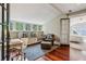 Inviting bonus room featuring hardwood floors, a built-in bench, and flexible open space for relaxation at 1371 N Highland Ne Ave, Atlanta, GA 30306