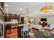 Open kitchen layout with a large island, stainless steel appliances, and seamless flow to the living area at 1371 N Highland Ne Ave, Atlanta, GA 30306