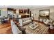 Spacious open-concept living room with hardwood floors and a kitchen view at 1371 N Highland Ne Ave, Atlanta, GA 30306