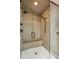 Modern shower featuring mosaic tile, dual shower heads, and a built-in bench for added comfort at 1371 N Highland Ne Ave, Atlanta, GA 30306