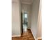 View of modern half bathroom with hexagon tile floors at 1766 W Lyle W Ave, College Park, GA 30337