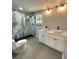 Modern bathroom with marble walk-in shower and double sink vanity at 1766 W Lyle W Ave, College Park, GA 30337