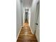 Hallway featuring hardwood floors and doors at 1766 W Lyle W Ave, College Park, GA 30337