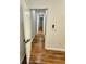 Hallway featuring hardwood floors and doors at 1766 W Lyle W Ave, College Park, GA 30337