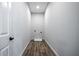 Compact laundry area featuring connections for washer and dryer with tiled floor at 754 Fayetteville Se Rd, Atlanta, GA 30316
