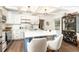 Modern kitchen with white cabinetry, a large island, and stainless steel appliances at 1443 Fama Ne Dr, Atlanta, GA 30329