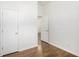 Bedroom features wood floor and a closet at 1636 Mary George Nw Ave, Atlanta, GA 30318