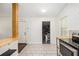 Clean, bright kitchen with stainless appliances and easy access to laundry area at 1636 Mary George Nw Ave, Atlanta, GA 30318
