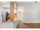 Open concept kitchen, stainless steel appliances, and tile floor at 1636 Mary George Nw Ave, Atlanta, GA 30318