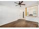 Open-concept living room featuring hardwood floors and a ceiling fan at 1636 Mary George Nw Ave, Atlanta, GA 30318