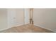 Neutral bedroom with carpet, two doors, and access to other rooms at 225 Limestone Cir, Conyers, GA 30013