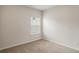 Bedroom with carpet, a window with blinds, and neutral walls at 225 Limestone Cir, Conyers, GA 30013