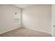 Bedroom with carpet, a window with blinds, and neutral walls at 225 Limestone Cir, Conyers, GA 30013