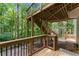 Multi-level deck overlooks lush green backyard at 2342 Tall Timbers Ln, Marietta, GA 30066