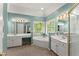 Bright primary bathroom featuring dual sinks, a soaking tub and a shower at 2342 Tall Timbers Ln, Marietta, GA 30066