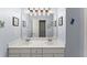 Bright bathroom featuring double sinks, a large mirror, and modern fixtures at 2342 Tall Timbers Ln, Marietta, GA 30066