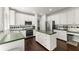 Charming kitchen with stainless steel appliances, an island, and white cabinets at 2342 Tall Timbers Ln, Marietta, GA 30066