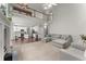 Open-concept living room with view of the kitchen and a spacious, comfortable gray sectional at 2342 Tall Timbers Ln, Marietta, GA 30066