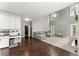 Spacious living room with high ceilings, decorative molding, and comfortable gray sectional seating at 2342 Tall Timbers Ln, Marietta, GA 30066