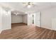 Open floorplan showing the living room with a view of the laundry room behind a door at 540 Alcovy Hills Dr, Lawrenceville, GA 30045