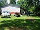 Spacious backyard with room to park a truck, boat and trailer and plenty of green space at 2900 Hitt Rd, Cumming, GA 30041
