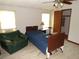 Cozy bedroom with wood flooring, closet, ceiling fan and comfortable furnishings at 2900 Hitt Rd, Cumming, GA 30041