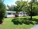 Single-story home with vinyl siding and a well-manicured lawn at 2900 Hitt Rd, Cumming, GA 30041