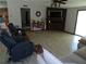 Inviting living room with a brick fireplace, large windows, and comfortable seating at 2900 Hitt Rd, Cumming, GA 30041