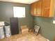 A photo of a miscellaneous room with dark green paneled walls at 2900 Hitt Rd, Cumming, GA 30041