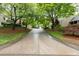 Long driveway leading to home at 303 Roswell Green Ln, Roswell, GA 30075