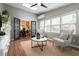 Inviting sunroom with skylights, a ceiling fan, and lots of natural light at 303 Roswell Green Ln, Roswell, GA 30075