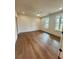This spacious bedroom features two windows and a ceiling fan for added comfort at 435 Chiswick Cir # 21, Alpharetta, GA 30009