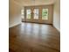 Dining room boasting hardwood floors, recessed lighting, and bright windows at 435 Chiswick Cir # 21, Alpharetta, GA 30009