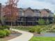 Beautiful brick townhomes with manicured landscaping and walking paths at 435 Chiswick Cir # 21, Alpharetta, GA 30009