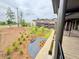 Beautifully landscaped walkway leading to townhome at 435 Chiswick Cir # 21, Alpharetta, GA 30009