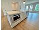 Kitchen island featuring microwave, dishwasher and sink at 435 Chiswick Cir # 21, Alpharetta, GA 30009
