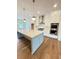 Bright kitchen with island, stainless appliances and hardwood floors at 435 Chiswick Cir # 21, Alpharetta, GA 30009