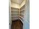 Pantry with organized white shelves at 435 Chiswick Cir # 21, Alpharetta, GA 30009